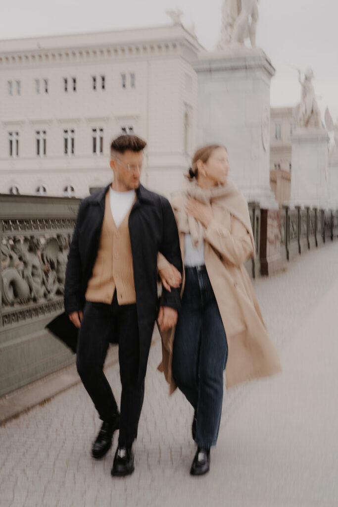 Couple walking during a photo shoot on Museum Island by Berlin wedding photographer Stories by Toni