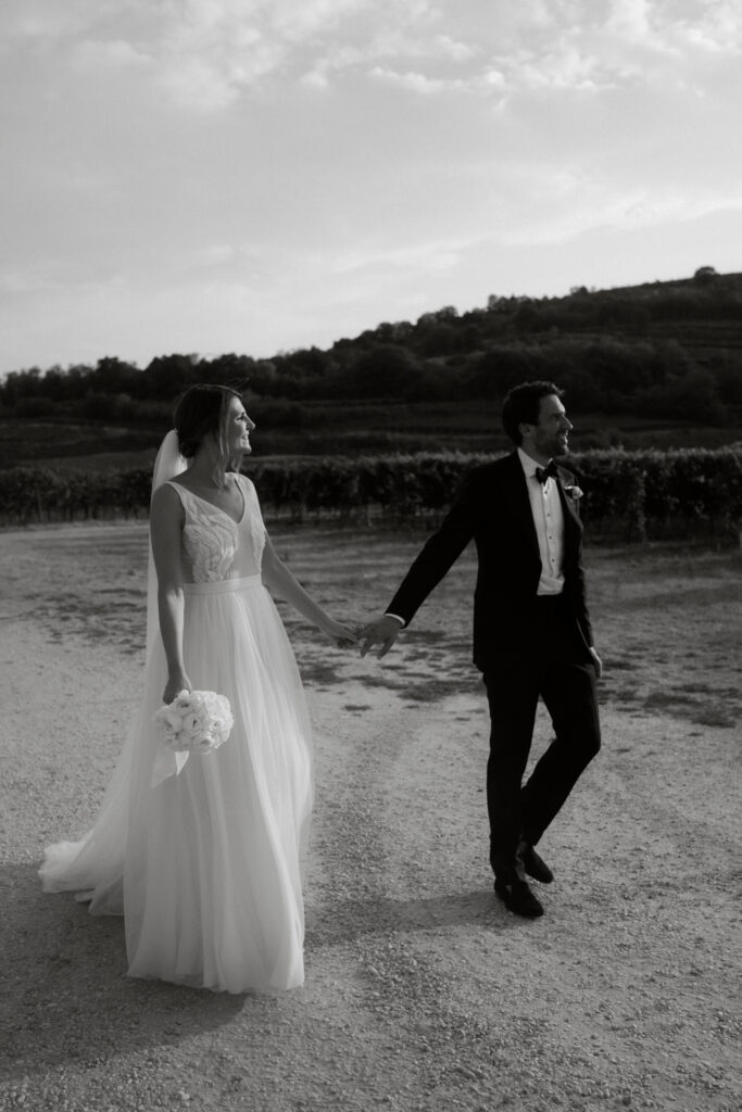 A wedding couple in the vineyards of Villa Verita Fraccaroli, captured by wedding photographer italy Stories by Toni